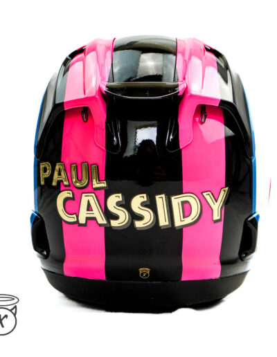 Back of the Paul Cassidy Isle of Man TT 2024 Helmet with the name in gold chrome and black and fluorescent pink stripes