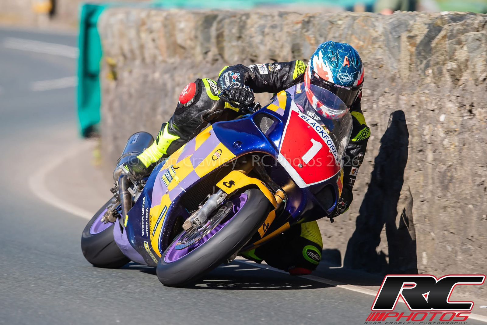 Grant Thomson number 1 on classic superbike at Billown, X-Paint helmet visible through the corner