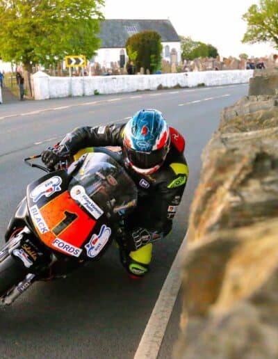 Grant Thomson racing at Billown circuit wearing his custom X-Paint helmet, Pre-TT Classic 2026
