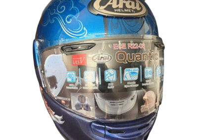 Detailed airbrush feather work on custom painted Arai Quantic motorcycle helmet, blush pink and white on violet metallic base