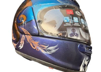 Bespoke airbrush painted motorcycle helmet with delicate feather detail in blush and white on deep violet metallic, X-Paint Camberley