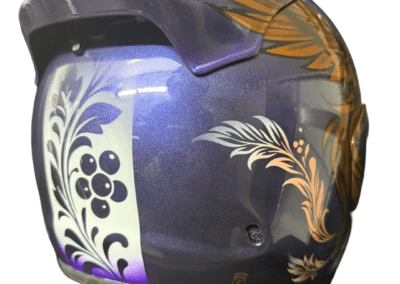 Arai Quantic helmet custom painted with Russian botanical folk art panel in black and violet on white, gold phoenix detail above