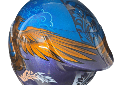 Bespoke airbrush painted motorcycle helmet with phoenix design in gold and amber on blue violet metallic, X-Paint Camberley
