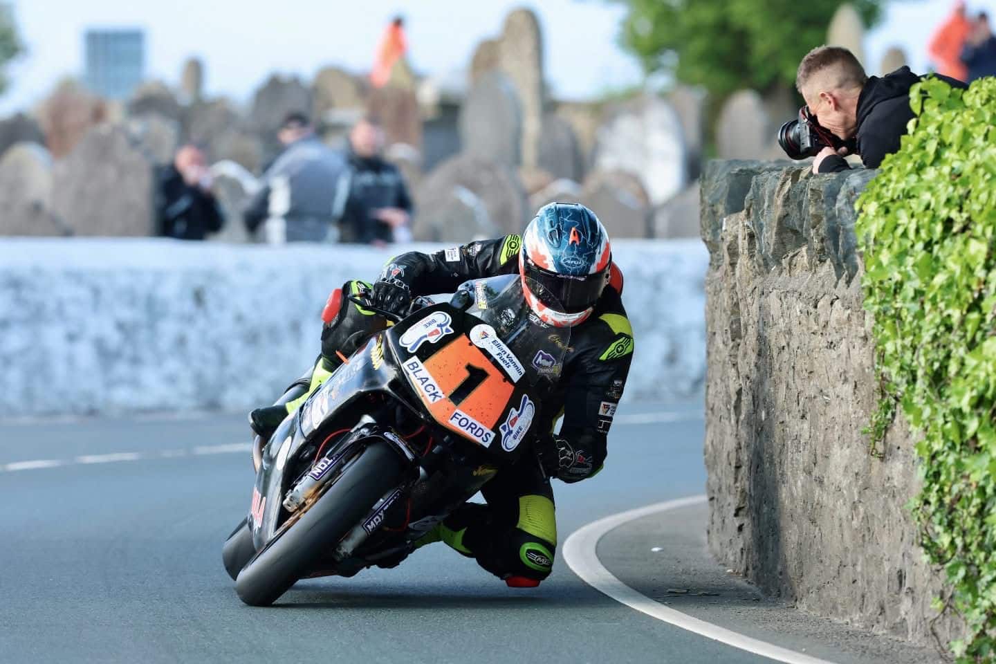 Grant Thomson racing inches from the wall at Billown in his X-Paint painted Arai helmet