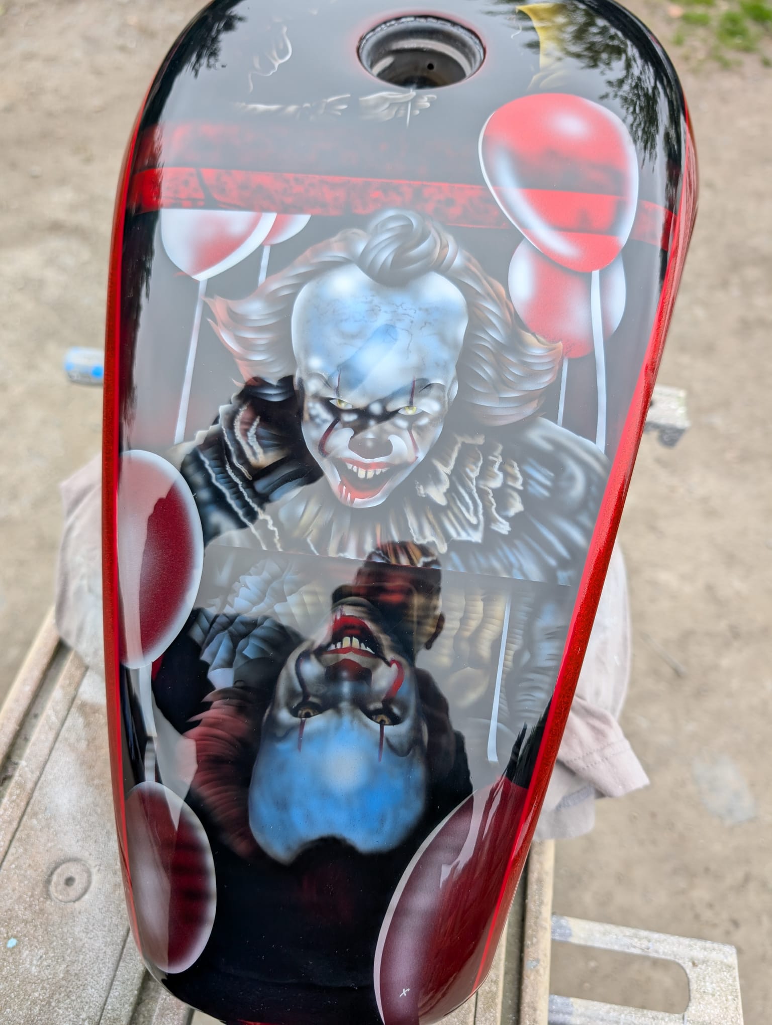 pictured is a Harley Davidson 48 gas tank, freshly fabricated and freshly custom painted by X-Paint